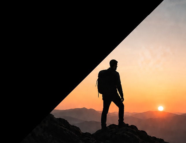 Silhouettes on a mountain ridge at sunset